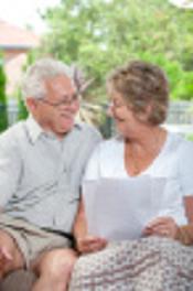 stock-photo-15852330-elderly-couple-talking-and-smiling.jpg