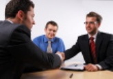 stock-photo-4786200-handshake-at-the-business-meeting